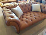 Grammy Harris Tweed and Leather Sofas.