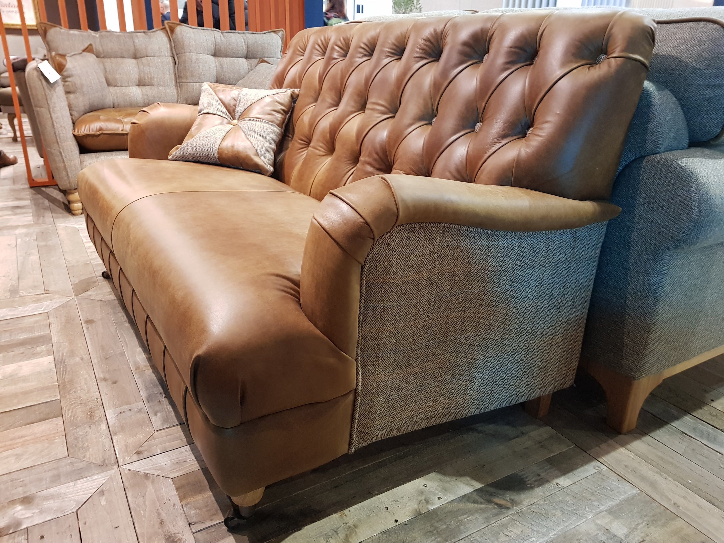 Jowler Harris Tweed and Leather Sofas.